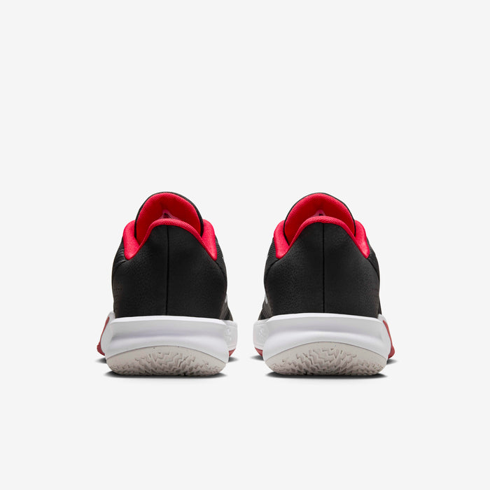 Nike Precision 7 basketball shoes Unisex in black and university red.