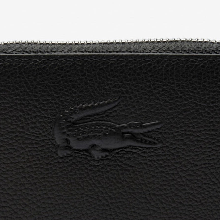 Lacoste zipped wallet with a matching tonal crocodile black, textured leather