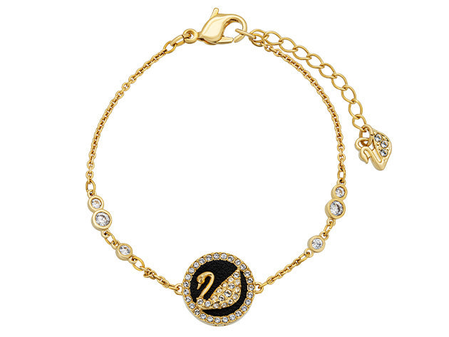 Swarovski Iconic Swan bracelet features a gold-tone plated chain