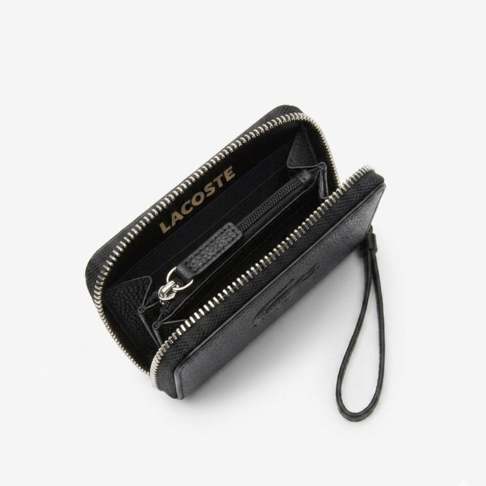 Lacoste zipped wallet with a matching tonal crocodile black, textured leather