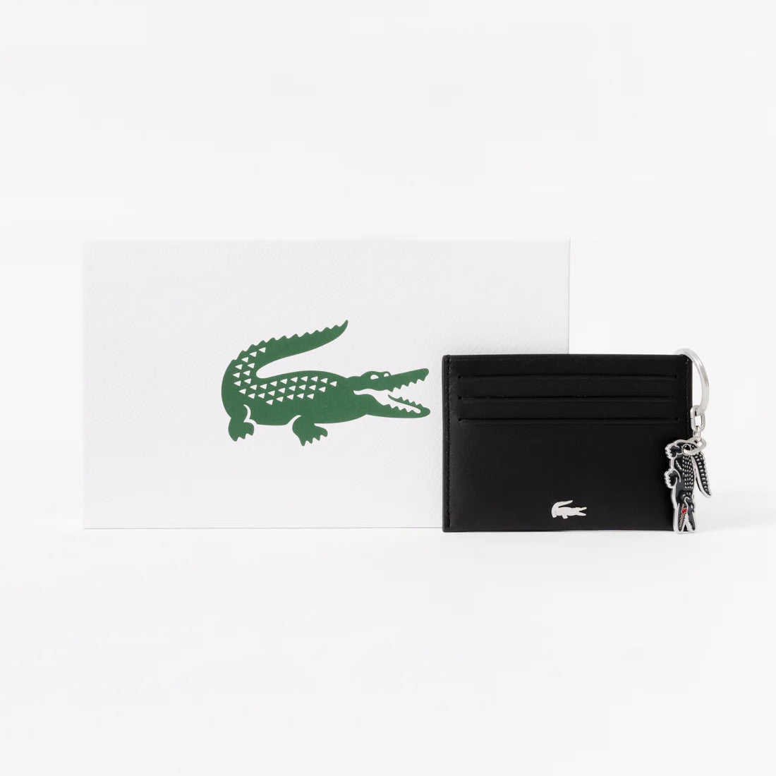 Lacoste Money Pieces black leather card holder set featuring an enameled crocodile keychain