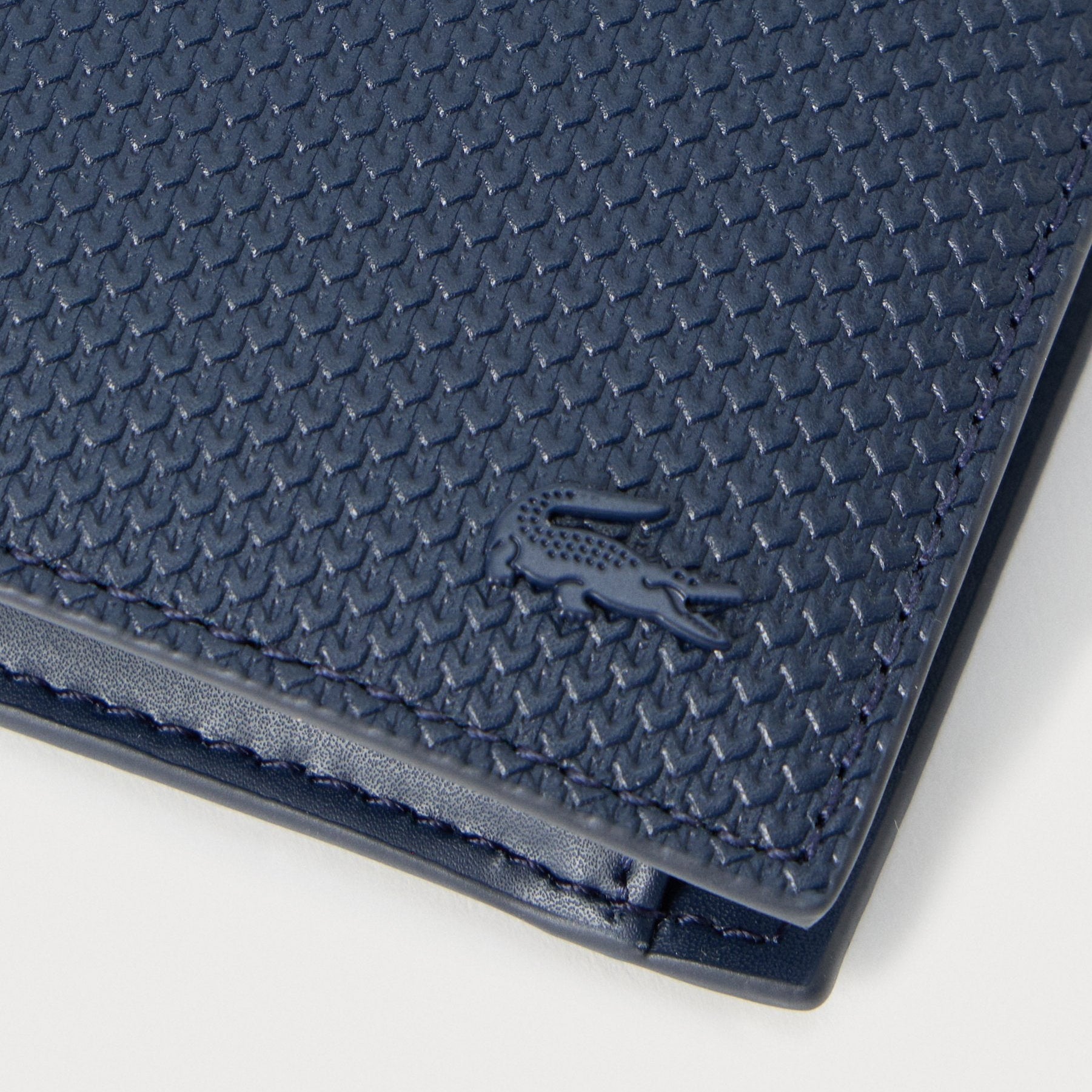 Lacoste Chantaco Piqué leather bifold wallet navy blue