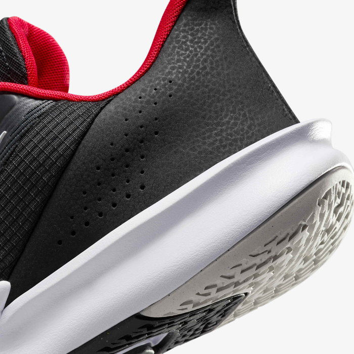Nike Precision 7 basketball shoes Unisex in black and university red.